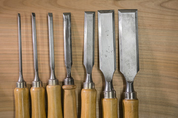 set of chisels on the workbench