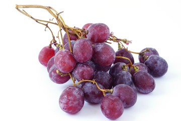 bunch of red grapes isolated on white background