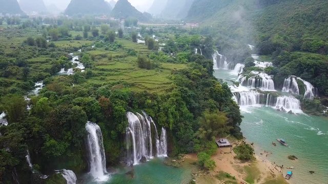 Ban Gioc waterfall or Detian waterfall is a collective name for two waterfalls in border Cao Bang, Vietnam and Daxin County, China. Royalty high-quality free stock video of a beautiful waterfall