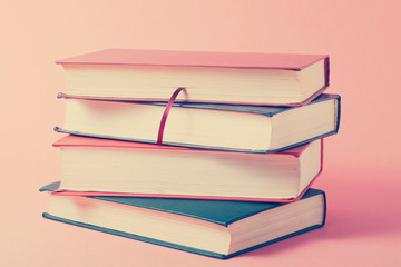 Stack of colorful books. Education background. Back to school. Copy space for text.