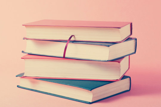 Stack of colorful books. Education background. Back to school. Copy space for text.