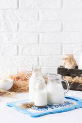 Milk in bottles of various shapes and sizes