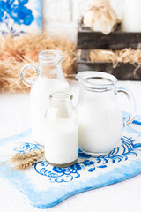 Milk in bottles of various shapes and sizes