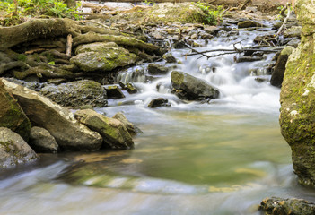 Naklejka na ściany i meble Nature background - water in stream