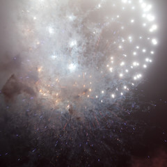 Beautiful sparks from fireworks in the sky at night