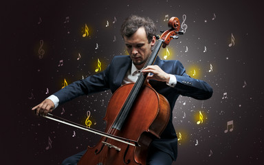 Fototapeta premium Young cellist with falling musical notes wallpaper and classical concept