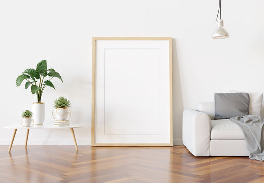Wooden frame leaning in bright white living room with plants and decorations mockup 3D rendering