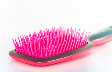 hairbush. Comb. Hair. Brush. Background. Woman tools. 