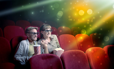 Fanciful couple watching miraculous part of a movie