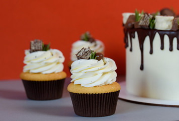 Board with delicious caramel cake on table
