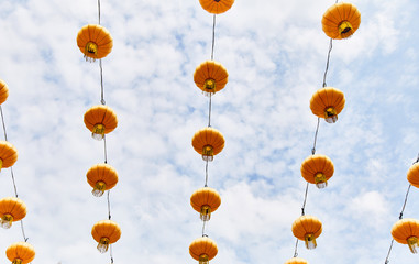 Bright yellow Chinese lanterns on the street of Singapore