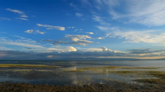 4K. Sunset on the salted lake Durgun Nuur, Mongolia. Ultra HD, 4096x2304