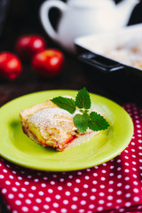 A slice of apple pie with mint