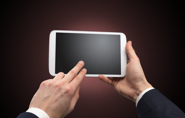 Hand using tablet with no concept and empty space
