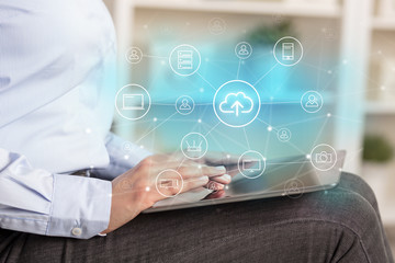 Business woman using tablet with network security and online storage system concept
