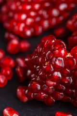 grains of a grenade on a dark rustic background