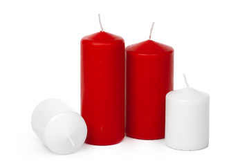 Wax colored candle isolated on white background close up