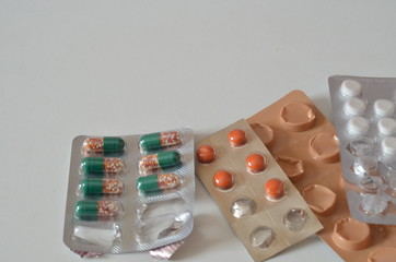 Different medicines: tablets, pills in blister pack, medications drugs, macro, selective focus,...