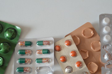 Different medicines: tablets, pills in blister pack, medications drugs, macro, selective focus,...