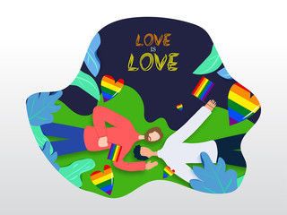 Fototapeta premium Love is Love concept for LGBTQ community with gay couple laying down and holding rainbow color freedom flag. Nature Background.