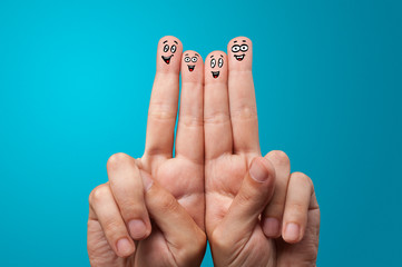 Happy face fingers hug each other 