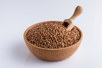 Grain buckwheat on a white acrylic background