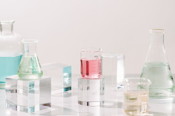 Bottles with different perfume oils on table