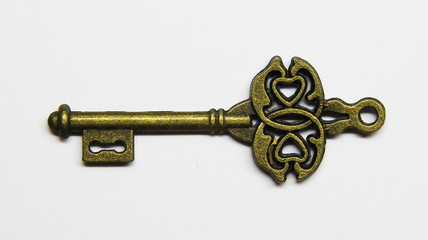 Key, isolated photo. Decorative item.
