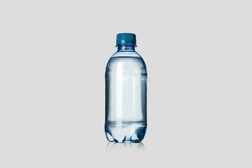 Plastic Bottle of pure Water on soft gray background. 3D rendering. Realistic Mock up.