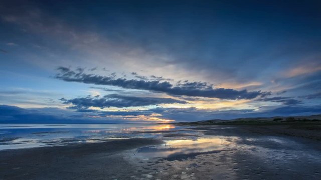 4K. Sunset on the salted lake Durgun Nuur, Mongolia. Ultra HD, 4096x2304