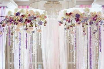Wedding arch of fresh flowers