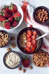 Muesli with nuts-almonds,hazelnuts and strawberries for Breakfast top view