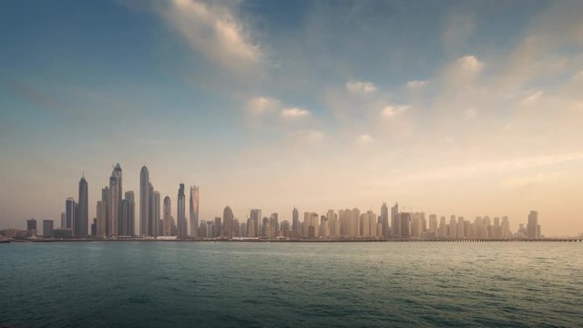 timelapse of skyscrapers in Dubai Marina, sunset time, UAE