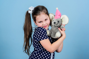 playground in kindergarten. small girl with soft bear toy. child psychology little girl play game in playroom. toy shop. childrens day. Best friend. happy childhood. Birthday. Girls love little bears