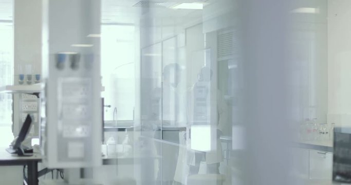 Scientist in a meeting with pharmaceutical sales rep