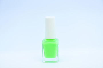 Gel polish modern technology. Pick color. Nail polish bottle bright color. Manicure salon. Beauty and care concept. Nail polish white background. Durability and quality of nail polish coating