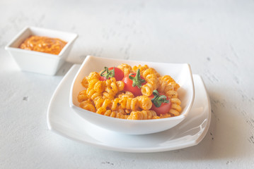 Portion of pasta with tomato and ricotta pesto