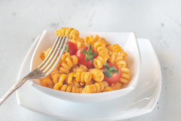 Portion of pasta with tomato and ricotta pesto
