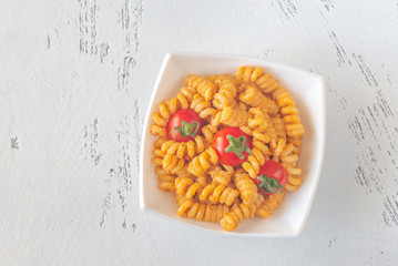 Portion of pasta with tomato and ricotta pesto