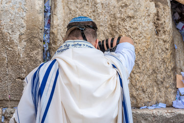Israel, Jerusalem - 31 December 2018: Men praying at the Western Wall