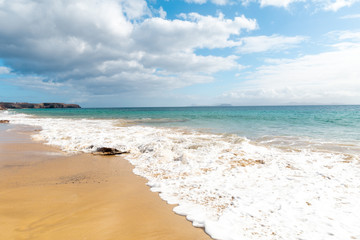 Panorama of beautiful beach and tropical sea of Lanzarote. Canaries