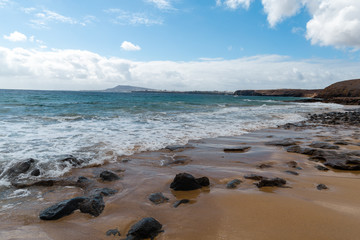 Fototapeta premium Panorama of beautiful beach and tropical sea of Lanzarote. Canaries