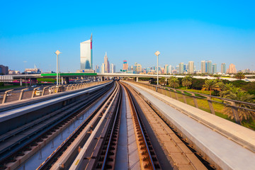 Dubai Metro and city skyline, UAE