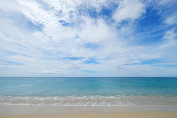 Fototapeta na wymiar Calm and clear sea view of turquoise water with small ripple wave on cloudy blue sky day