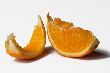 A piece of oranges isolated on a white background.