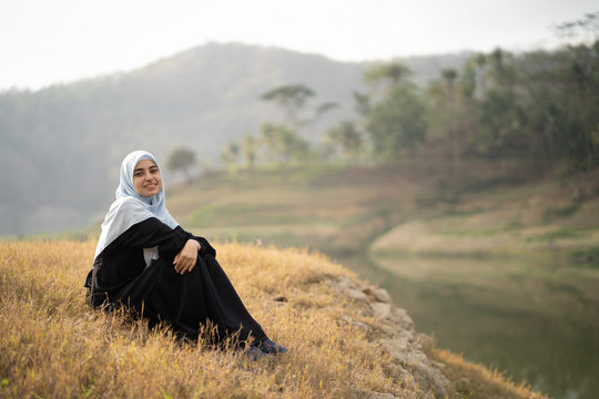 muslim arabic woman at beautiful outdoor enjoy carefree concept