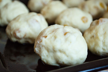 Preparations for cooking homemade buns with raisins