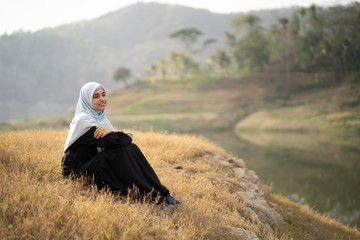 muslim arabic woman at beautiful outdoor enjoy carefree concept