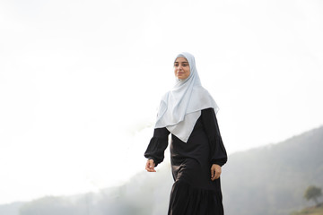 muslim arabic woman at beautiful outdoor enjoy carefree concept