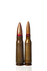 Two old bullets for automatic rifles of 5.45 and 7.62 caliber. Selective focus.